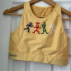 Peloton high neck sports bra yellow with stick figure